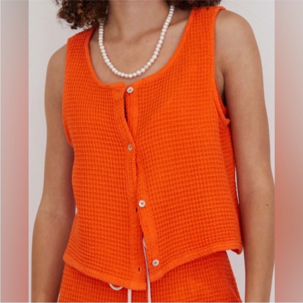 DONNI. Orange waffle top